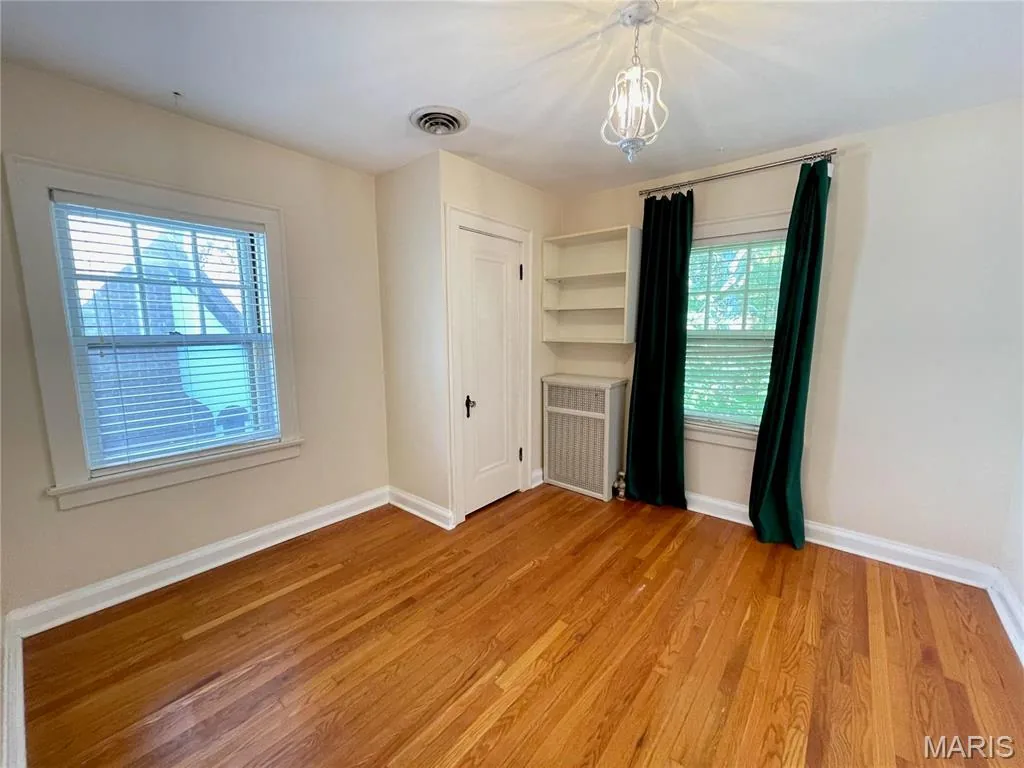 Bedroom with built-in shelf