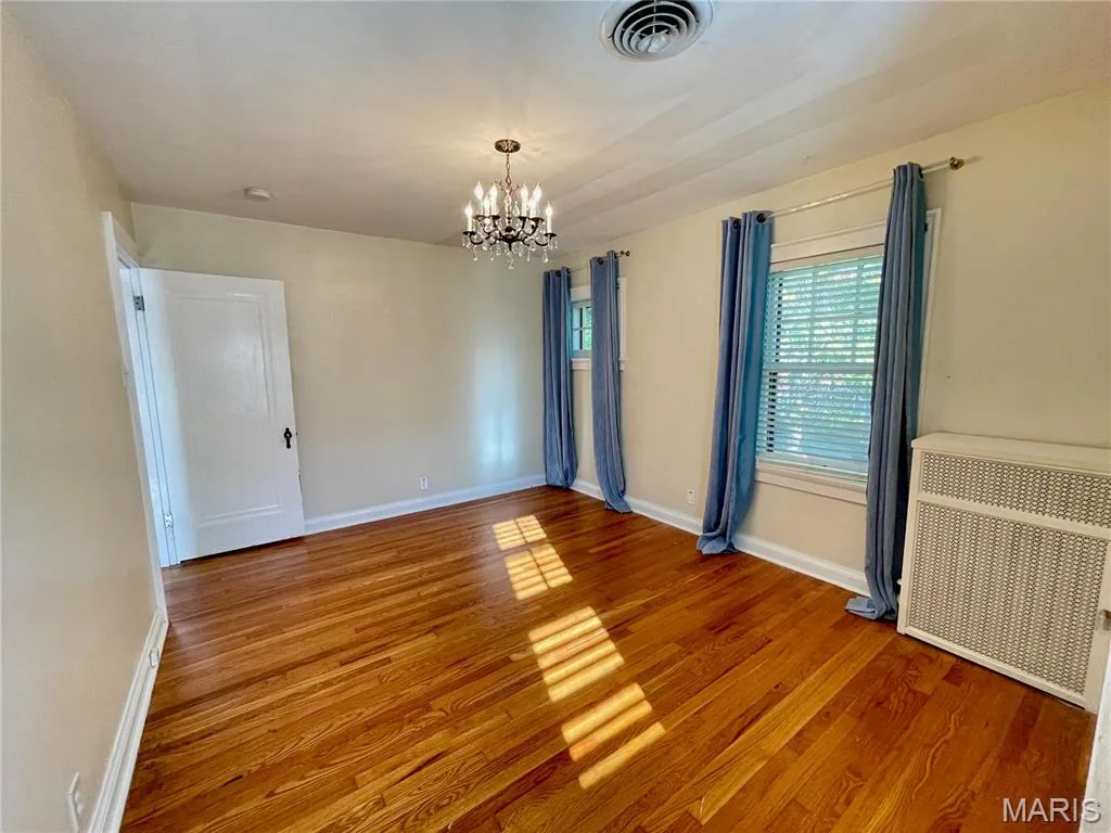 Bedroom with chandelier